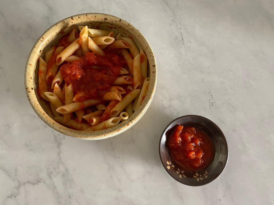 5 minute marinara sauce on a bowl of pasta and in a small bowl on its own