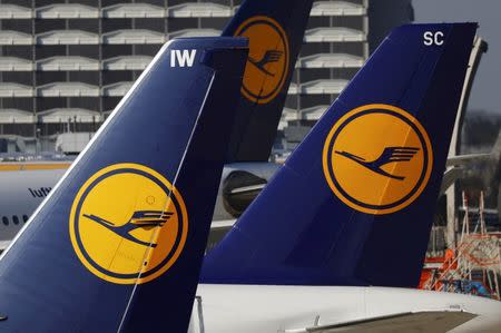 Planes of the Lufthansa airline stand on the tarmac in Frankfurt airport, Germany, March 17, 2016. REUTERS/Kai Pfaffenbach/File Photo