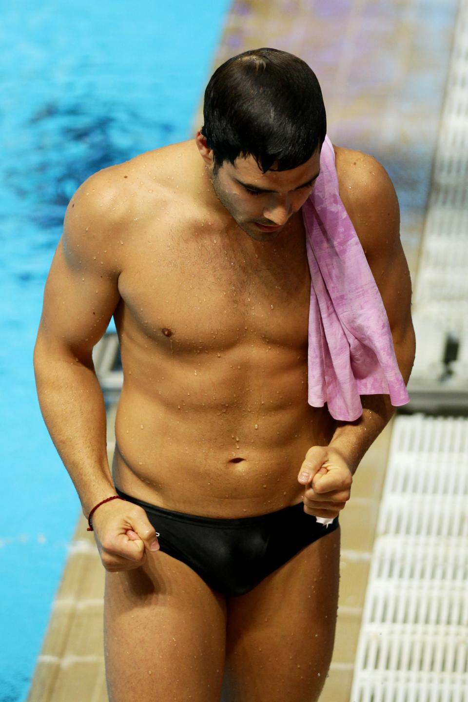 DELHI, INDIA - OCTOBER 11: Alexandre Despatie of Canada celebrates after winning the gold medal in the Men's 3m Springboard Final at Dr. S.P. Mukherjee Aquatics Complex during day eight of the Delhi 2010 Commonwealth Games on October 11, 2010 in Delhi, India. (Photo by Matt King/Getty Images)