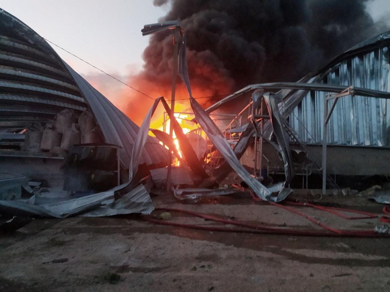 A view shows a grain warehouse destroyed by a Russian missile strike, amid Russia's attack on Ukraine (via REUTERS)