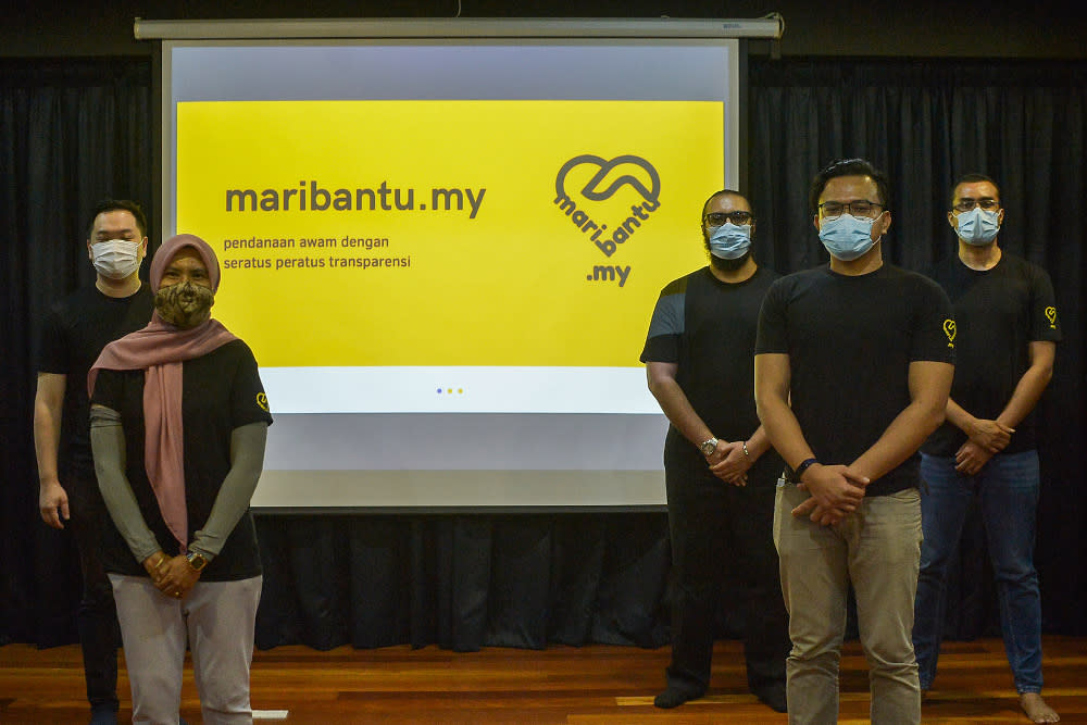 Muda members are seen during the launch of maribantu.my in Petaling Jaya on April 9, 2021. — Picture by Miera Zulyana