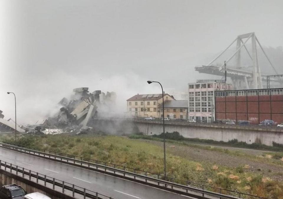 Wreckage: A huge chasm of debris is left behind after 650ft of the bridge crumbled. (Rex)