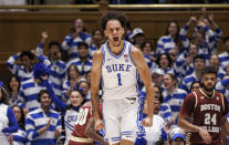 Duke's Dereck Lively II (1) celebrates after a dunk during the first half of an NCAA college basketball game against Boston College in Durham, N.C., Saturday, Dec. 3, 2022. (AP Photo/Ben McKeown)