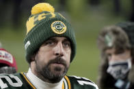 Green Bay Packers quarterback Aaron Rodgers (12) walks off the field after the NFC championship NFL football game against the Tampa Bay Buccaneers in Green Bay, Wis., Sunday, Jan. 24, 2021. The Buccaneers defeated the Packers 31-26 to advance to the Super Bowl. (AP Photo/Morry Gash)