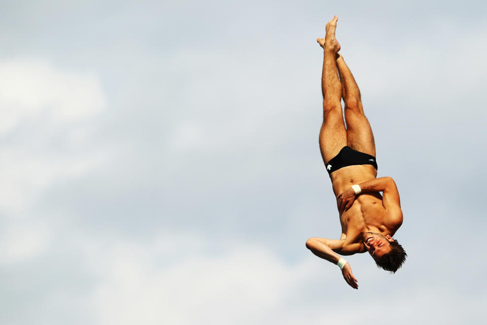 FORT LAUDERDALE, FL - MAY 10: Riley McCormick of Canada dives during the Mens 10m Platform Semi Finals at the Fort Lauderdale Aquatic Center on Day 1 of the AT&T USA Diving Grand Prix on May 10, 2012 in Fort Lauderdale, Florida. (Photo by Al Bello/Getty Images)