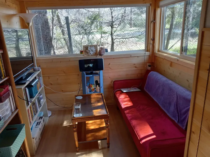 tinyhome living room with couch and table
