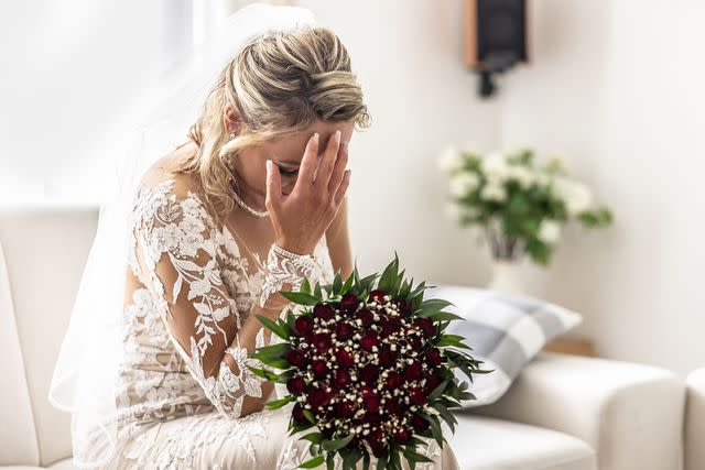 <p>Getty</p> Stock image of a bride upset.