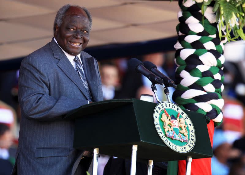 FILE PHOTO: Kenya's President Mwai Kibaki delivers his speech during national celebrations to mark 49th Jamhuri Day, at Nyayo National Stadium in Nairobi