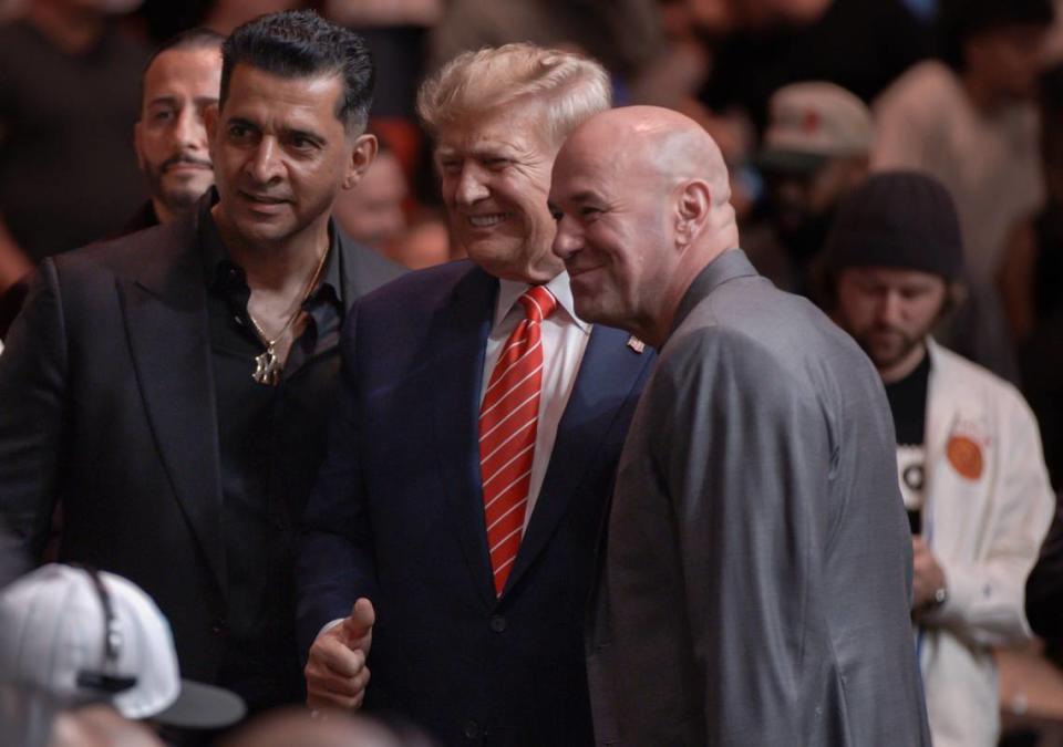 Former President Donald Trump interacts with UFC President Dana White at the UFC 299 event at the Kaseya Center on Saturday, March 9, 2024, in downtown Miami, Fla. MATIAS J. OCNER/mocner@miamiherald.com