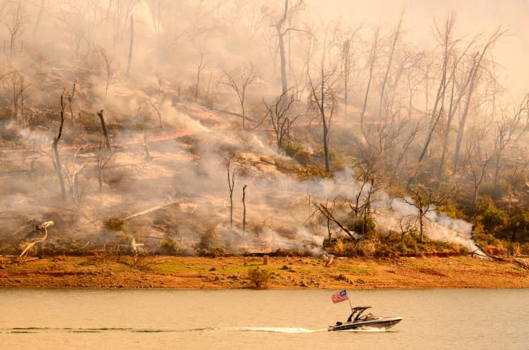 An out-of-control fire in northern California has promoted warnings for thousands of people to flee (JOSH EDELSON)