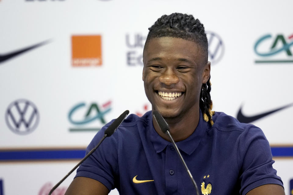 France's Eduardo Camavinga smiles during a press conference at the Jassim Bin Hamad stadium in Doha, Qatar, Saturday, Nov. 19, 2022, ahead of the upcoming World Cup. France will play their first match in the World Cup against Australia on Nov. 22. (AP Photo/Christophe Ena)