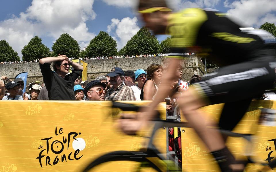 The road to Paris has turned yellow for July as the Tour dominates the sporting landscape - Getty Images