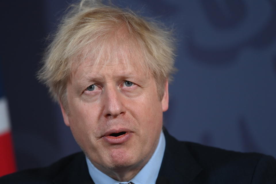 Britain's Prime Minister Boris Johnson speaks during a media briefing in Downing Street, London, Thursday, Dec. 24, 2020. Britain and the European Union have struck a provisional free-trade agreement that should avert New Year’s chaos for cross-border commerce and bring a measure of certainty to businesses after years of Brexit turmoil. The breakthrough on Thursday came after months of tense and often testy negotiations that whittled differences down to three key issues: fair-competition rules, mechanisms for resolving future disputes and fishing rights. (Paul Grover/Pool Photo via AP)