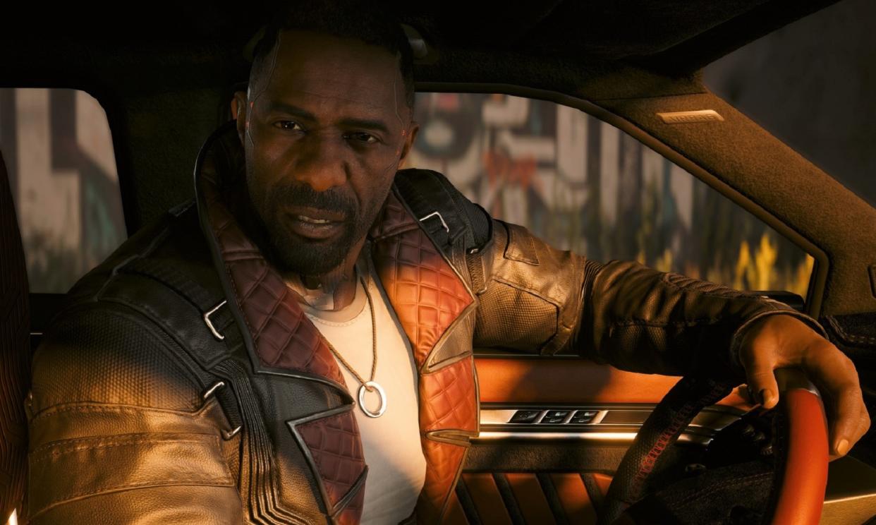  Idris Elba addressing you from car front seat. 