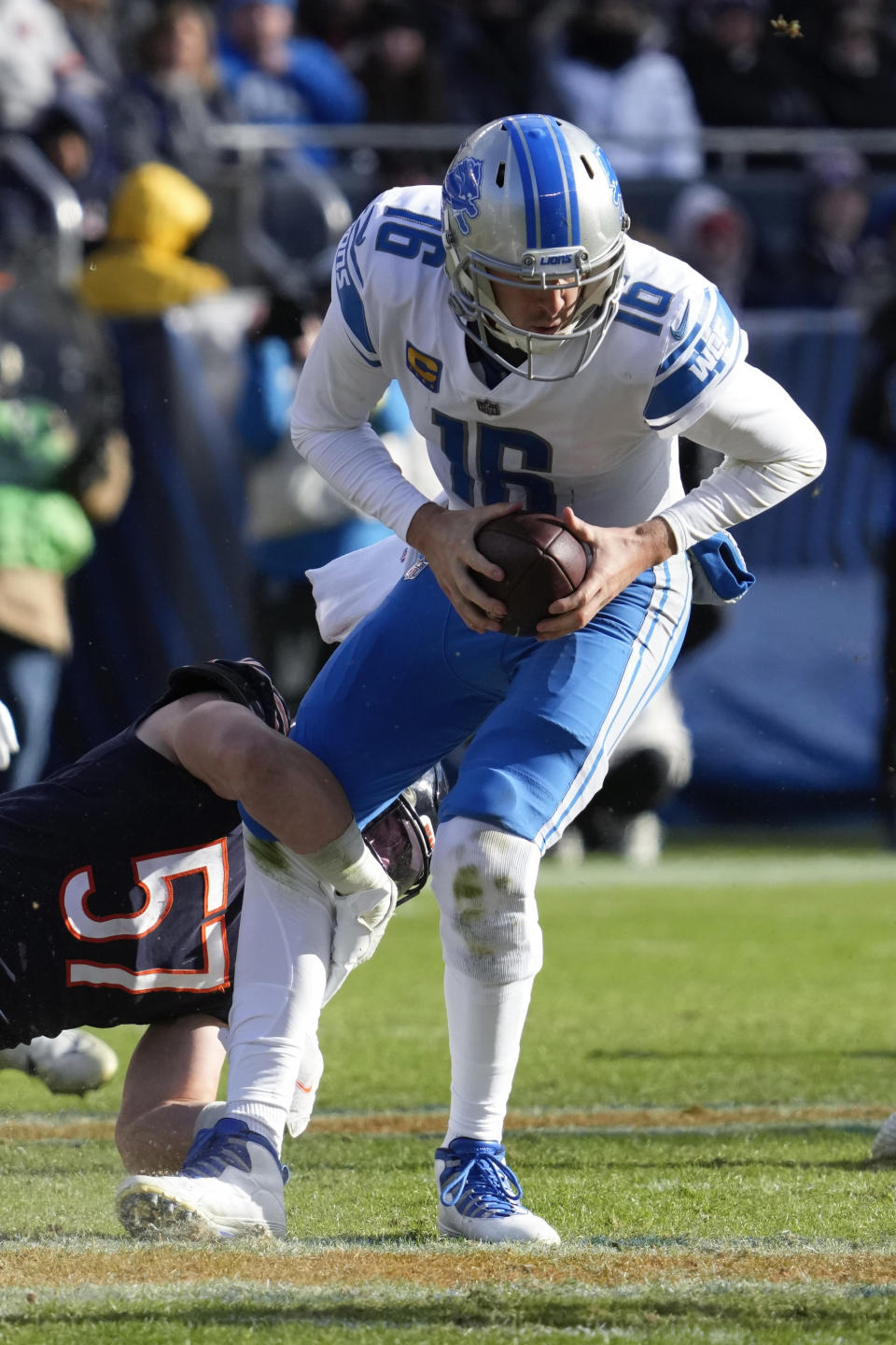 Chicago Bears linebacker Jack Sanborn (57) sacks Detroit Lions quarterback Jared Goff (16) during the second half of an NFL football game in Chicago, Sunday, Nov. 13, 2022. (AP Photo/Nam Y. Huh)