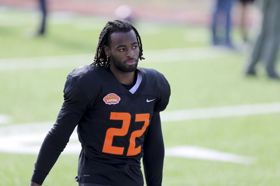 Alabama's Najee Harris walks to the sideline during the Senior Bowl.