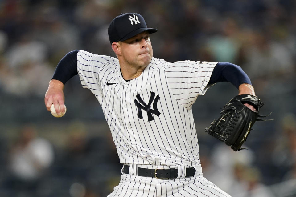 New York Yankees starting pitcher Corey Kluber throws during the first inning of the team's baseball game against the Cleveland Indians, Friday, Sept. 17, 2021, in New York. (AP Photo/John Minchillo)