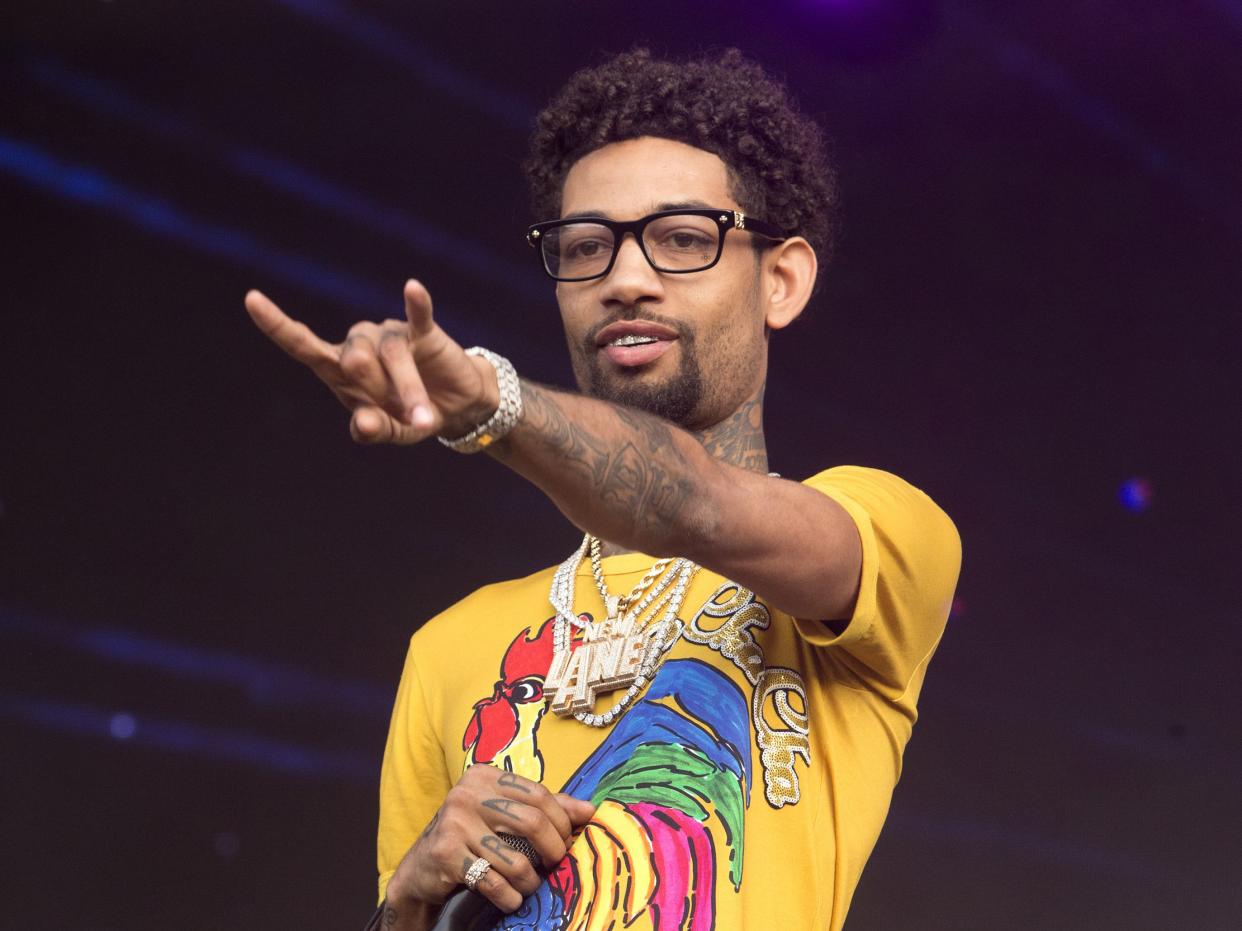 FILE - Philadelphia rapper PnB Rock performs at the 2018 Firefly Music Festival in Dover, Del., on June 16, 2018. The rapper, whose real name is Rakim Allen, was fatally shot during a robbery in South Los Angeles on Monday, Sept. 12, 2022. He is best known for his 2016 hit “Selfish.” 