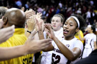 South Carolina guard Tyasha Harris (52) celebrates a win over Connecticut with fans after an NCAA college basketball game Monday, Feb. 10, 2020, in Columbia, S.C. (AP Photo/Sean Rayford)