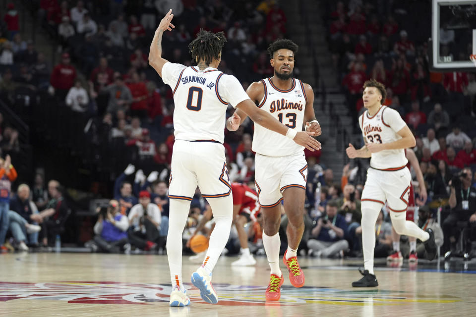 Illinois guard Terrence Shannon Jr. (0) gestures after making a 3-point shot during the second half of an NCAA college basketball game against Nebraska in the semifinal round of the Big Ten Conference tournament, Saturday, March 16, 2024, in Minneapolis. (AP Photo/Abbie Parr)
