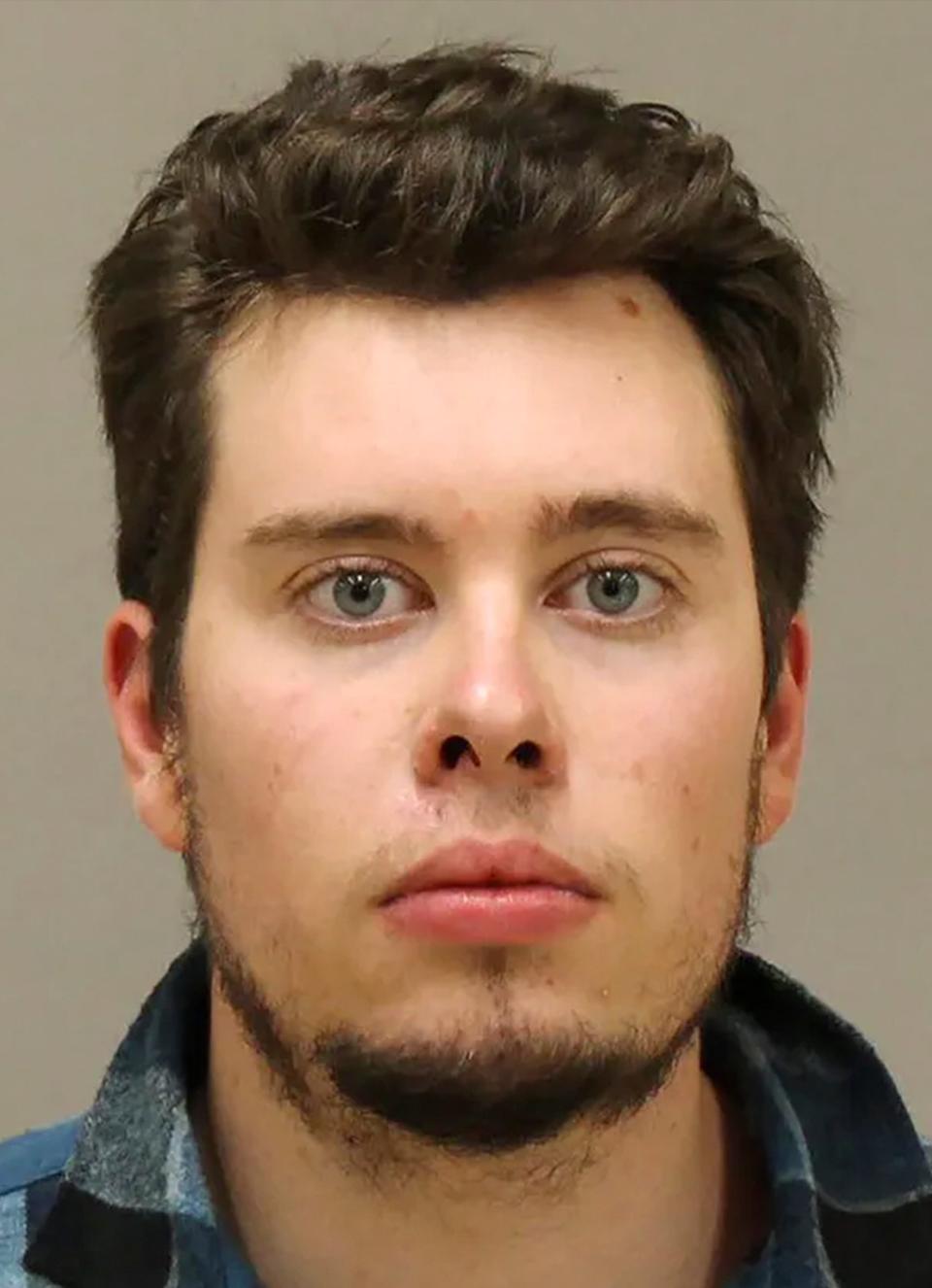 <p>Ty Garbin is shown in a booking photo. Garbin, one of six men charged in an alleged plot to snatch Michigan Gov. Gretchen Whitmer has agreed to plead guilty to a kidnapping conspiracy.</p> (AP)