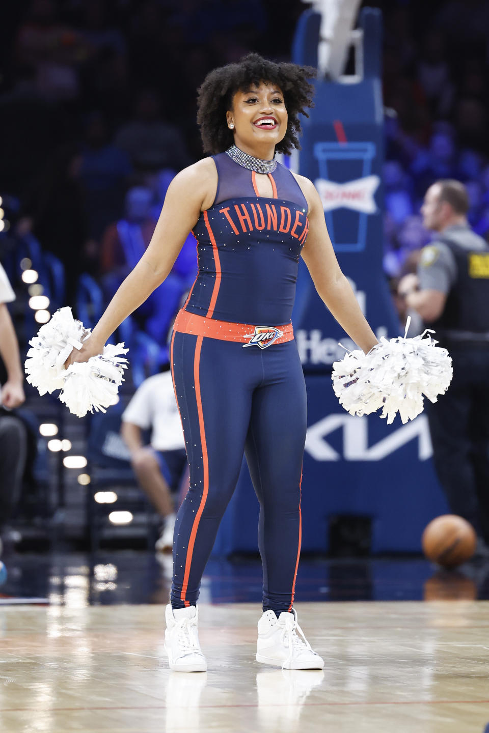 Dec 31, 2023; Oklahoma City, Oklahoma, USA; An Oklahoma City Thunder Girl performs during a time out against the Brooklyn Nets during the second half at Paycom Center. Mandatory Credit: Alonzo Adams-USA TODAY Sports