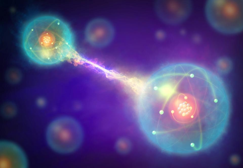 Conceptual artwork of a pair of entangled quantum particles or events (left and right) interacting at a distance. Quantum entanglement is one of the consequences of quantum theory. Two particles will appear to be linked across space and time, with changes to one of the particles (such as an observation or measurement) affecting the other one.