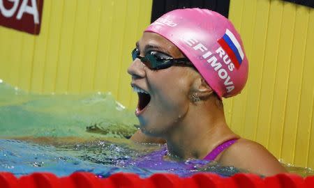 Swimming – 17th FINA World Aquatics Championships – Women's 100m Breaststroke semifinal – Budapest, Hungary – July 24, 2017 – Yuliya Efimova of Russia reacts after coming first. REUTERS/Stefan Wermuth