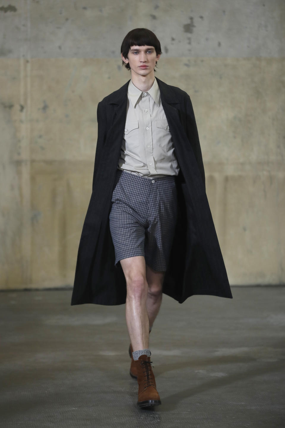 A model wears a creation as part of the Fabio Quaranta men's Fall-Winter 2020/21 collection, that was presented in Milan, Italy, Monday, Jan. 13, 2020. (AP Photo/Antonio Calanni)