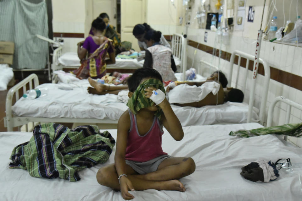 Children receive treatment at a hospital following a chemical gas leak in Vishakhapatnam, India, Friday, May 8, 2020. Indian authorities evacuated more people from villages near a South Korean-owned chemical factory where a gas leak killed 12 people and left about 1,000 struggling to breathe. Authorities said the evacuation was precautionary, but it triggered panic among people overnight that another gas leak was occurring. (AP Photo)