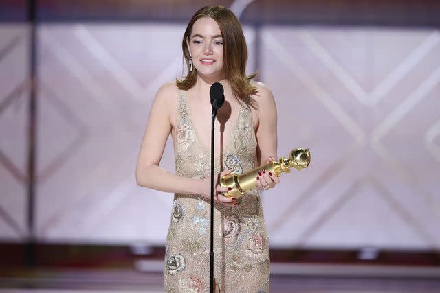 <p>Rich Polk/Golden Globes 2024/Golden Globes 2024 via Getty Images</p> Emma Stone accepts the award for Best Performance by a Female Actor in a Motion Picture Musical or Comedy for "Poor Things" at the 81st Golden Globe Awards held at the Beverly Hilton Hotel on January 7, 2024