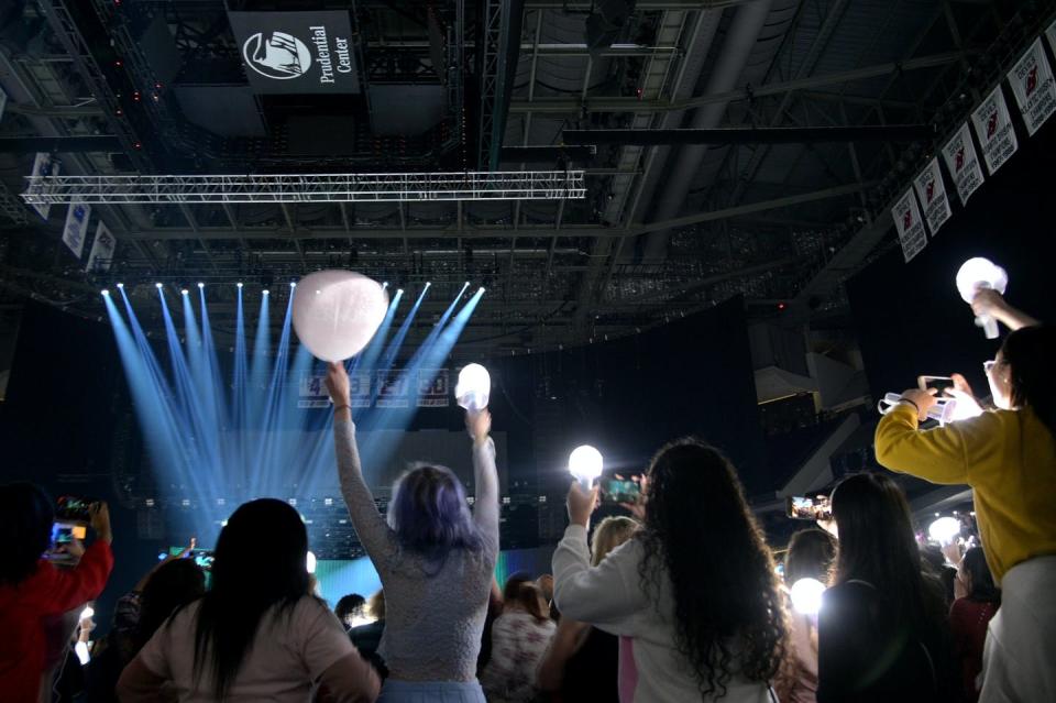 <span class="caption">K-pop fans in the U.S. have been urging industry professionals to speak out.</span> <span class="attribution"><a class="link " href="https://www.gettyimages.com/detail/news-photo/fans-watch-seventeen-perform-in-concert-during-their-ode-to-news-photo/1198765399?adppopup=true" rel="nofollow noopener" target="_blank" data-ylk="slk:Michael Loccisano/Getty Images;elm:context_link;itc:0;sec:content-canvas">Michael Loccisano/Getty Images</a></span>