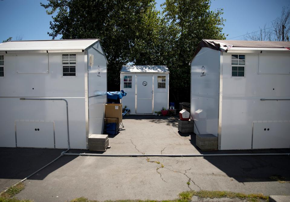 Low-barrier shelters such as these at a site on Portland Road NE are meant to be the first step in assisting houseless people and connecting them with services.