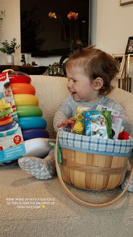 <p>Jenna Johnson/Instagram</p> Rome cries while checking out the contents of his Easter basket