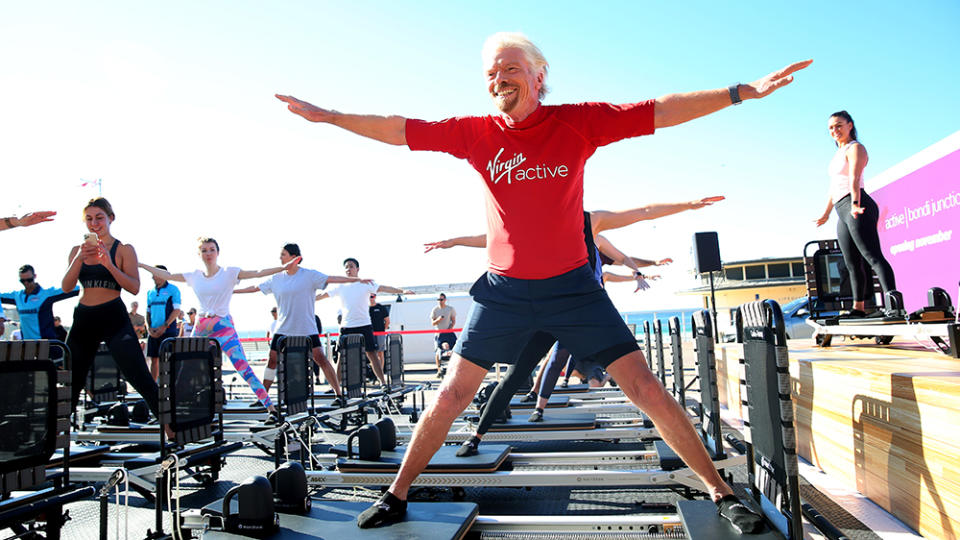 Branson takes part in a pilates class at Bondi Beach in Sydney, Australia in 2019. - Credit: Don Arnold