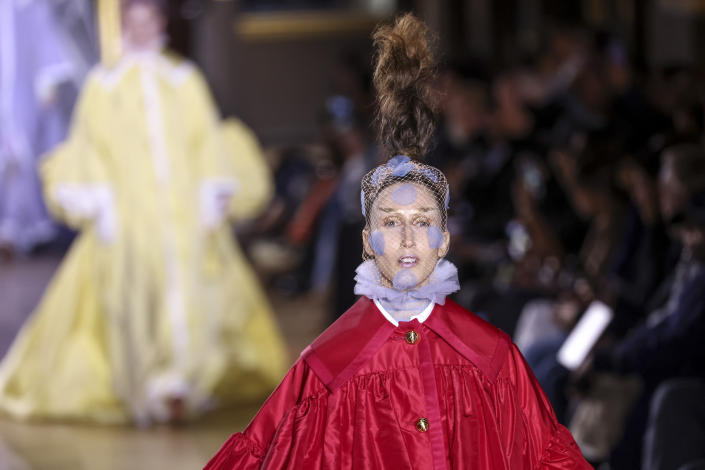 Anna Cleveland wears a creation for the Thom Browne ready-to-wear Spring/Summer 2023 fashion collection presented Monday, Oct. 3, 2022 in Paris. (Photo by Vianney Le Caer/Invision/AP)