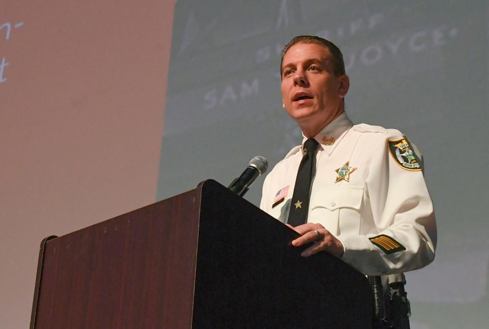 Indian River County Sheriff Eric Flowers speaks during the Unsung Heroes of Indian River County event, on Wednesday, Feb. 2, 2022, at the Vero Beach High School Performing Arts Center. The event, presented by the School District of Indian River County and Oslo Middle School, for Black History Month, recognizes the past and present Black law enforcement officers. 