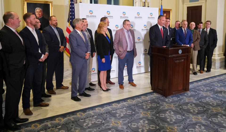 Gov.Kevin Stitt, Senate President Pro Tem Greg Treat and House Speaker Charles McCall, along with other members from the House and Senate, hold a news conference Monday to announce their historic education reform agreement.