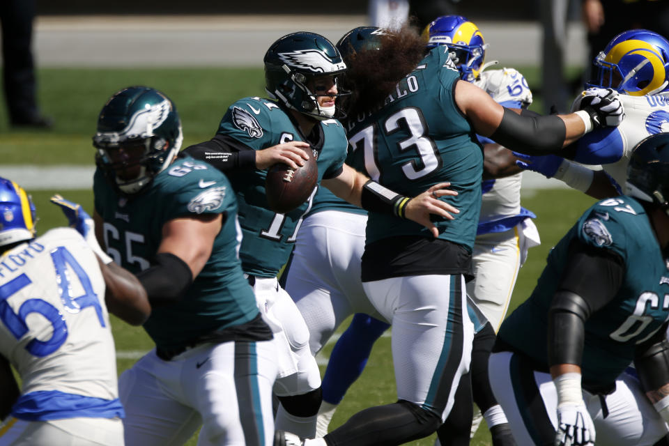 Philadelphia Eagles' Carson Wentz plays during the first half of an NFL football game against the Los Angeles Rams, Sunday, Sept. 20, 2020, in Philadelphia. (AP Photo/Laurence Kesterson)