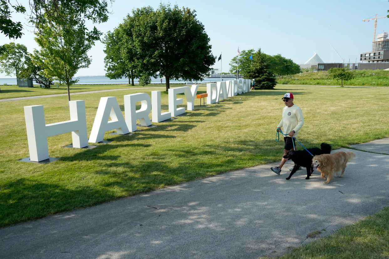 A large Harley-Davidson stands at the entrance to Veterans Park in Milwaukee for the Harley-Davidson 120th anniversary festival in 2023.