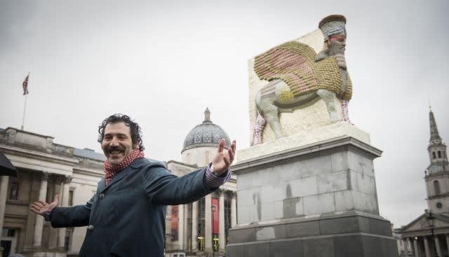 Michael Rakowitz with his sculpture "The Invisible Enemy Should Not Exist" after its unveiling in Trafalgar Square