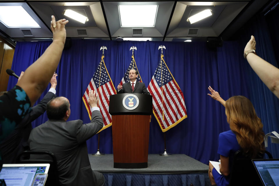 Labor Secretary Alex Acosta calls on a reporter to ask a question during a news conference at the Department of Labor, Wednesday, July 10, 2019, in Washington. (AP Photo/Alex Brandon)