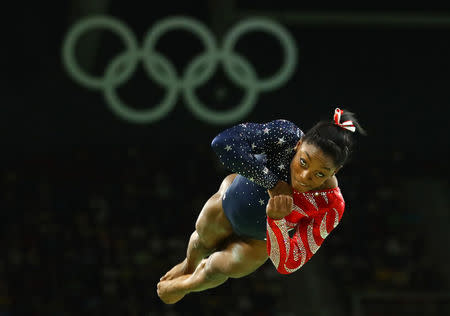 Simone Biles competes on the floor. REUTERS/Mike Blake
