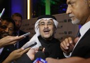 Saudi Arabia's state-owned oil company Aramco CEO Amin Al-Nasser, talks to reporters during the official ceremony marking the debut of Aramco's initial public offering (IPO) on the Riyadh's stock market in Riyadh, Saudi Arabia, Wednesday, Dec. 11, 2019. (AP Photo/Amr Nabil)