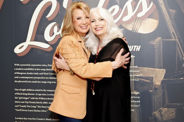<p>Jason Kempin/Getty </p> Patty Loveless and Emmylou Harris at Patty Loveless: No Trouble with the Truth, at Country Music Hall of Fame and Museum on Aug. 22, 2023 in Nashville