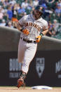 San Francisco Giants' Evan Longoria rounds the bases after hitting a two-run home run during the seventh inning of a baseball game against the Chicago Cubs in Chicago, Friday, Sept. 10, 2021. (AP Photo/Nam Y. Huh)