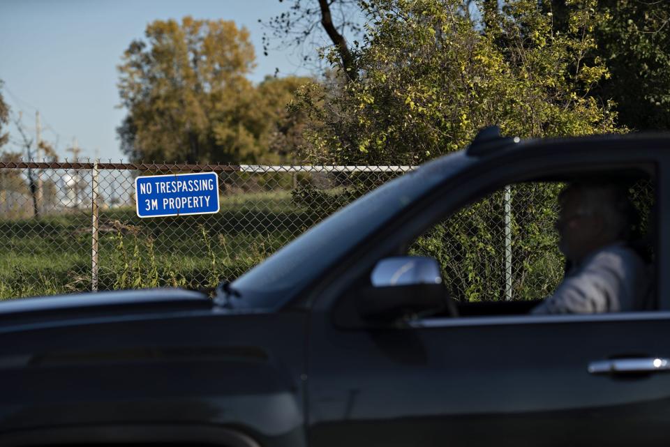 File: A vehicle passes in front of a 'No Trespassing' sign outside a 3M Co. disposal site in Oakdale, Minnesota, U.S., on Thursday, Oct. 18, 2018. 3M's Cottage Grove factory had been churning out some varieties of PFAS since the 1950s for the water- and stain-repellant Scotchgard.