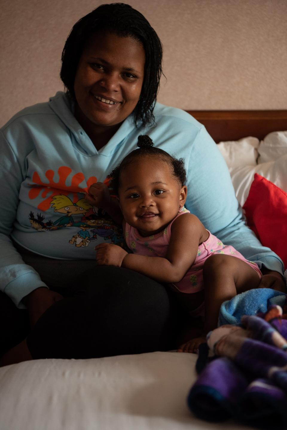 Jennie Spencer was awarded a rapid rehousing voucher but has not been able to find a place to rent in her more than 8 month search. She and her one year old daughter (name withheld) recently moved out of a homeless shelter to stay temporarily in a hotel. Spencer and her daughter moments after settling into their hotel room.