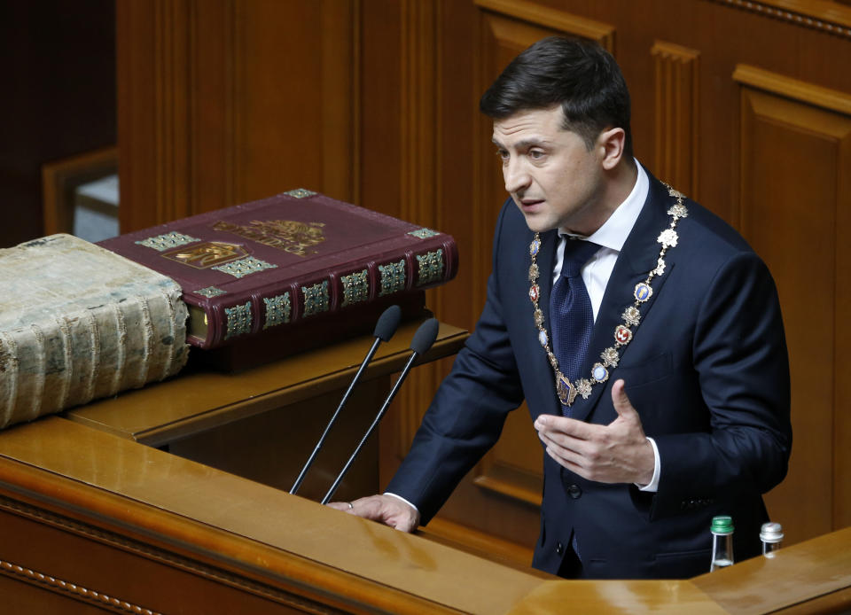 Ukrainian new President Volodymyr Zelenskiy gestures while speaking during his inauguration ceremony in Kiev, Ukraine, Monday, May 20, 2019. Television star Volodymyr Zelenskiy has been sworn in as Ukraine's next president after he beat the incumbent at the polls last month. The ceremony was held at Ukrainian parliament in Kiev on Monday morning. (AP Photo/Efrem Lukatsky)