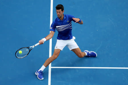 Tennis - Australian Open - First Round - Melbourne Park, Melbourne, Australia, January 15, 2019. Serbia’s Novak Djokovic in action during the match against Mitchell Krueger of the U.S. REUTERS/Lucy Nicholson